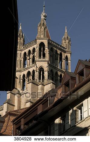 Switzerland, Canton of Vaud, region of Leman, Lausanne, bell tower of Our Lady of Lausanne Cathedrale from Place de la Palude View Large Photo Image Stock Photo - Switzerland, Canton of Vaud, region of Leman, Lausanne, bell tower of Our Lady of Lausanne Cathedrale from Place de la Palude. Fotosearch