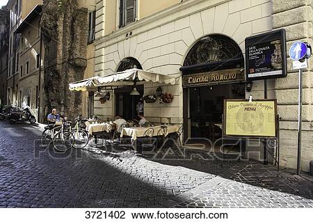 Stock Image - Terrace of an Italian restaurant, Rome, Lazio, Italy. Fotosearch