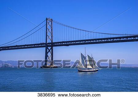 USA, California, San Francisco, ship under Oakland Bay Bridge View Large Photo Image Stock Photography - USA, California, San Francisco, ship under Oakland Bay Bridge. Fotosearch