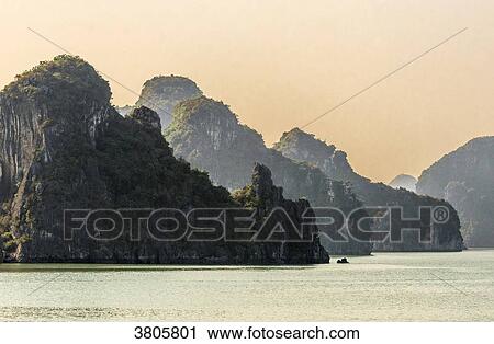 Vietnam, Ha Long Bay at sunset, (UNESCO World Heritage) View Large Photo Image Stock Image - Vietnam, Ha Long Bay at sunset, (UNESCO World Heritage). Fotosearch