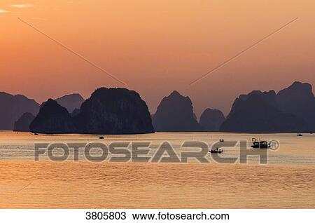 Vietnam, Ha Long Bay at sunset, (UNESCO World Heritage) View Large Photo Image Stock Image - Vietnam, Ha Long Bay at sunset, (UNESCO World Heritage). Fotosearch