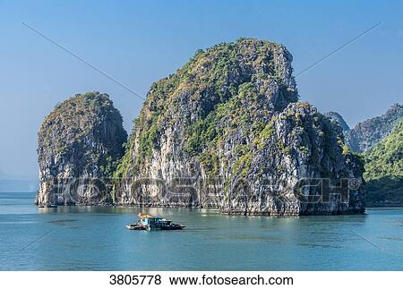 Vietnam, Ha Long Bay, fisher's small boat (UNESCO World Heritage) View Large Photo Image Stock Photo - Vietnam, Ha Long Bay, fisher's small boat (UNESCO World Heritage). Fotosearch