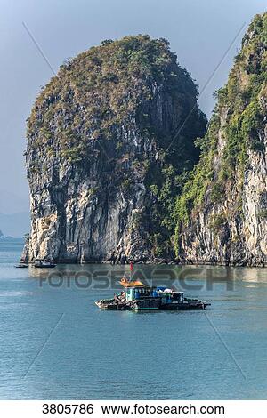 Vietnam, Ha Long Bay, fisher's small boat (UNESCO World Heritage) View Large Photo Image Stock Photograph - Vietnam, Ha Long Bay, fisher's small boat (UNESCO World Heritage). Fotosearch