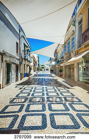 View of a street in the city of Faro, Algarve region, Portugal View Large Photo Image Stock Photo - View of a street in the city of Faro, Algarve region, Portugal. Fotosearch