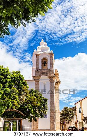View of the bell tower of the town of Burgau, Algarve region, Portugal View Large Photo Image Stock Photo - View of the bell tower of the town of Burgau, Algarve region, Portugal. Fotosearch