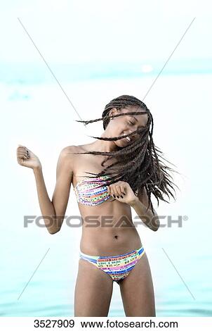 West indian smiling young girl dancing View Large Photo Image Stock Photo - West indian smiling young girl dancing. Fotosearch