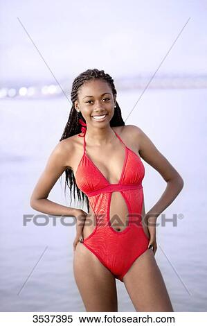 West indian smiling young girl in swimsuit View Large Photo Image Stock Photography - West indian smiling young girl in swimsuit. Fotosearch