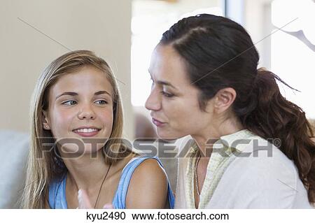 Woman discussing with her daughter View Large Photo Image Stock Image - Woman discussing with her daughter. Fotosearch