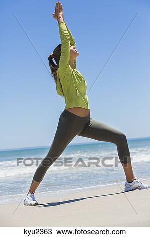 Woman exercising on the beach View Large Photo Image Stock Image - Woman exercising on the beach. Fotosearch