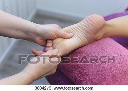 Stock Image - Woman in a beauty parlour.. Massage. Fotosearch