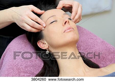 Stock Image - Woman in a beauty parlour.. Fotosearch