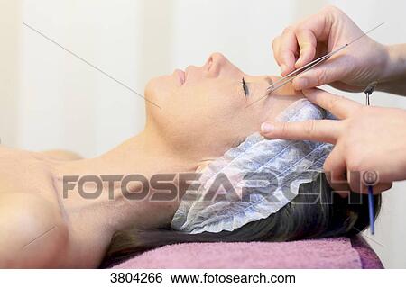 Woman in a beauty parlour. View Large Photo Image Stock Photograph - Woman in a beauty parlour.. Fotosearch