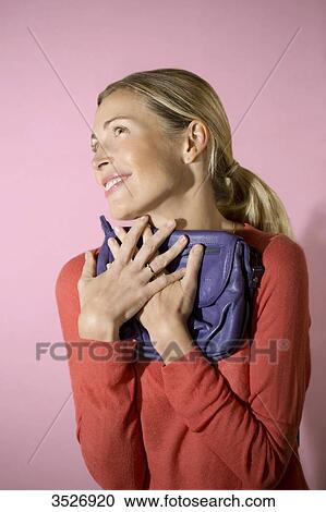 Woman loving her bag View Large Photo Image Stock Image - Woman loving her bag. Fotosearch