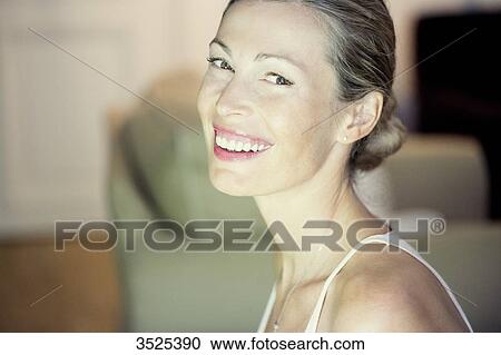 Woman smiling View Large Photo Image Stock Image - Woman smiling. Fotosearch