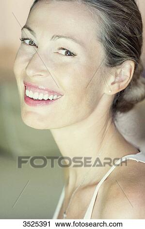 Stock Image - Woman smiling. Fotosearch