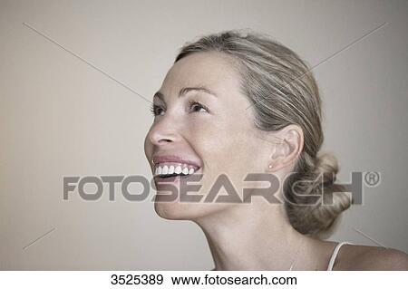 Stock Photo - Woman smiling. Fotosearch