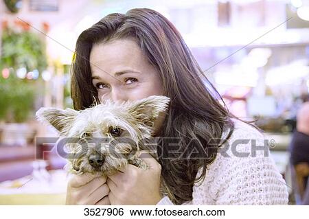 Stock Photograph - Woman with her dog. Fotosearch