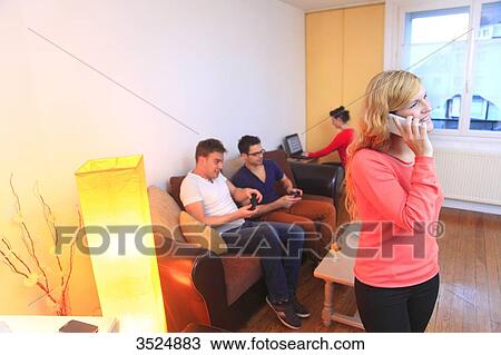 Young adult flat sharing View Large Photo Image Stock Image - Young adult flat sharing. Fotosearch