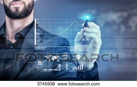 Young business man writing on a virtual screen View Large Photo Image Stock Photo - Young business man writing on a virtual screen. Fotosearch