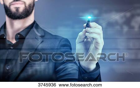 Young business man writing on a virtual screen View Large Photo Image Stock Photograph - Young business man writing on a virtual screen. Fotosearch