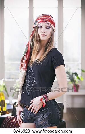 Young woman in shorts, t-shirt and headband Sanhadja View Large Photo Image Stock Image - Young woman in shorts, t-shirt and headband Sanhadja. Fotosearch