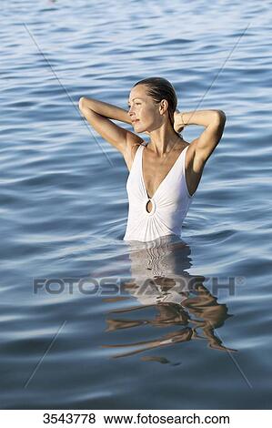 Young woman in the sea View Large Photo Image Stock Photo - Young woman in the sea. Fotosearch