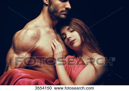 Young woman sleeping in her man's arms View Large Photo Image Stock Image - Young woman sleeping in her man's arms. Fotosearch