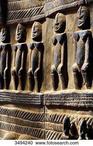 Stock Image - Africa, Mali, art and craft, Dogon craft, wooden sculptures on Dogon doors in Sangha. Fotosearch