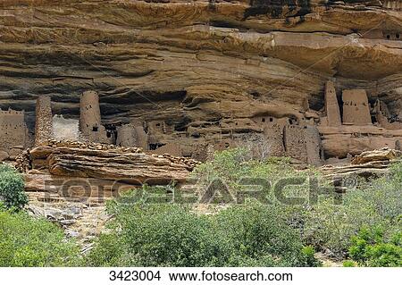 Africa, Mali, Pays Dogon, former troglodyte village serving as burial sites for the Dogon View Large Photo Image Picture - Africa, Mali, Pays Dogon, former troglodyte village serving as burial sites for the Dogon. Fotosearch