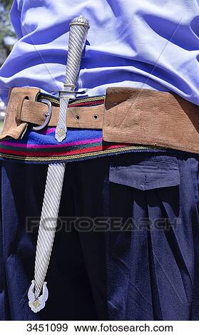 Argentina, Neuquen, gaucho with his traditional harness. Dagger View Large Photo Image Stock Photo - Argentina, Neuquen, gaucho with his traditional harness. Dagger. Fotosearch
