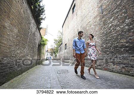 Stock Image - Belgium, couple in Brugge.. Fotosearch