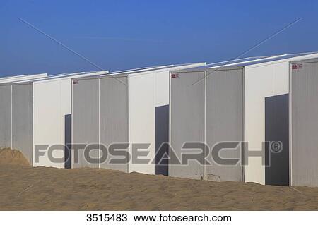 Stock Image - Belgium, St Idesbald. Beach huts.. Fotosearch