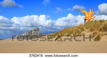 Belgium. Westende Bad. Art on the beach. Beaufort04. The artwork 'Olnetop' by artist Nick Ervinck. View Large Photo Image Stock Photograph - Belgium. Westende Bad. Art on the beach. Beaufort04. The artwork 'Olnetop' by artist Nick Ervinck.. Fotosearch