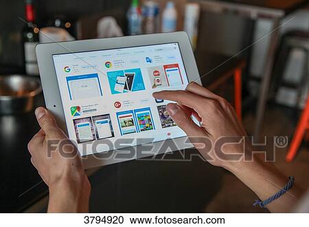 Boy lookinf for Google information on a tablet View Large Photo Image Stock Image - Boy lookinf for Google information on a tablet. Fotosearch