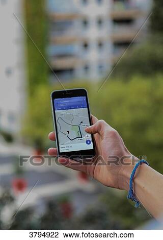 Boy lookinf for Google map information on his smart phone View Large Photo Image Stock Image - Boy lookinf for Google map information on his smart phone. Fotosearch