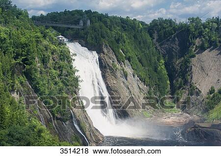 Canada, Province of Quebec. In the neighborhood of Quebec: the Montmorency Falls, 83 meters high View Large Photo Image Stock Photo - Canada, Province of Quebec. In the neighborhood of Quebec: the Montmorency Falls, 83 meters high. Fotosearch
