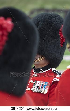 Stock Image - Canada, Province of Quebec. Quebec town. The Citadel shelters the 22nd Royal Regiment, the only French-speaking regiment of Canada. The changin of the guard. Busby. Fotosearch