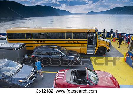 Canada, Province of Quebec. Tadoussac. The ferry allows to cross the fjord of Saguenay and to reach Tadoussac View Large Photo Image Stock Image - Canada, Province of Quebec. Tadoussac. The ferry allows to cross the fjord of Saguenay and to reach Tadoussac. Fotosearch
