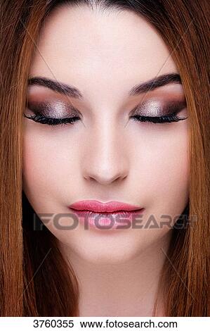 Close up of a pretty girl with silver makeup View Large Photo Image Stock Photography - Close up of a pretty girl with silver makeup. Fotosearch