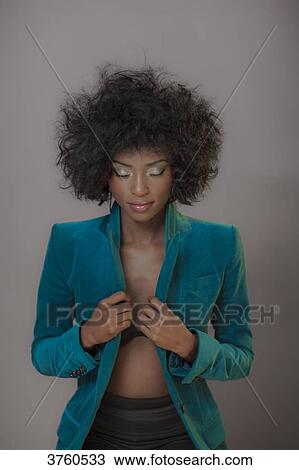 Close up of a young attractive African women wearing a color jacket View Large Photo Image Stock Image - Close up of a young attractive African women wearing a color jacket. Fotosearch