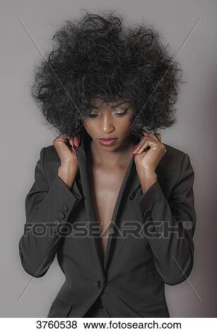 Close up of a young attractive African women View Large Photo Image Stock Photo - Close up of a young attractive African women. Fotosearch