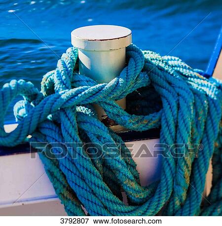 Close up on a blue vintage nautical rope View Large Photo Image Stock Photo - Close up on a blue vintage nautical rope. Fotosearch