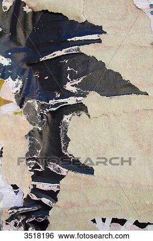 Stock Photograph - Close-up on torn posters.. Fotosearch