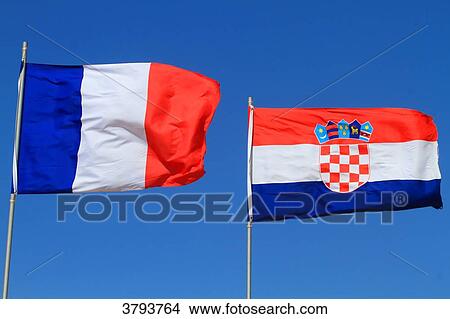 Croatian and french flags in blue sky. View Large Photo Image Picture - Croatian and french flags in blue sky.. Fotosearch
