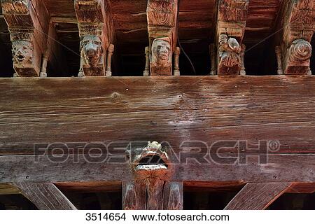 France, Ariege, figures carved on the wooden beams supporting medieval houses of Mirepoix View Large Photo Image Picture - France, Ariege, figures carved on the wooden beams supporting medieval houses of Mirepoix. Fotosearch