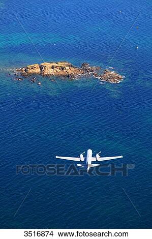 France, Brittany, Morbihan. Aerial view. Moelan sur mer. Beach of Trenez et L'ile Percee flown over by a Breguet Atlantic. View Large Photo Image Picture - France, Brittany, Morbihan. Aerial view. Moelan sur mer. Beach of Trenez et L'ile Percee flown over by a Breguet Atlantic.. Fotosearch