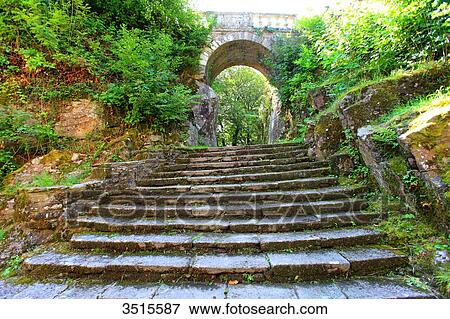 Stock Photo - France, Brittany, Morbihan. Le Faouet or Ar Faoued. Sainte Barbe du Faouet Chapel. Archway towards the oratory. Fotosearch