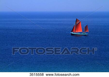 France, Brittany, old ship with red sails on blue sea. View Large Photo Image Stock Photo - France, Brittany, old ship with red sails on blue sea.. Fotosearch