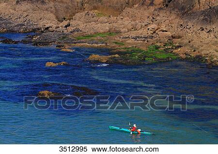 France, Brittany, Rade de Brest, Fisherman on a sea kayak. View Large Photo Image Stock Photography - France, Brittany, Rade de Brest, Fisherman on a sea kayak.. Fotosearch
