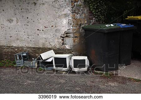 Stock Photo - France, Bulky waste in the street, recycling and pollution problem. Fotosearch